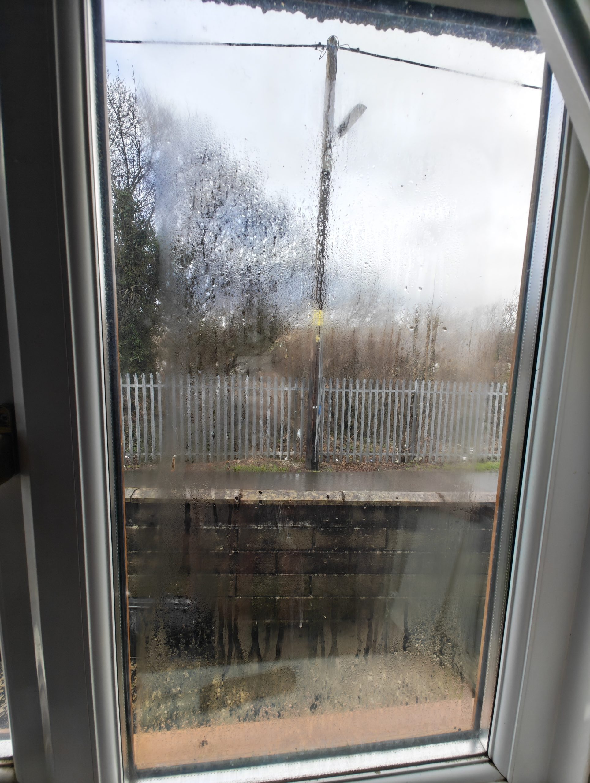 Before — misted double glazing with condensation between panes, Sketty Swansea